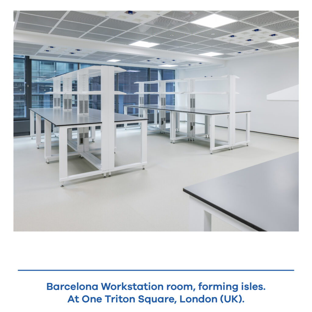Real laboratory installation featuring multiple Barcelona modular workstations arranged in a complete workspace.