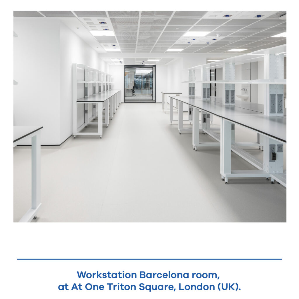Real laboratory installation featuring multiple Barcelona modular workstations arranged in a complete workspace.